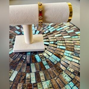 Elegant gold-plated four leaf clover bangle. Stackable. Price is for one.